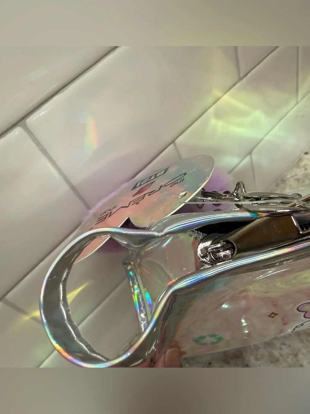 Crème Shop holographic BT21 pouch with purple fuzzy star charm NWT